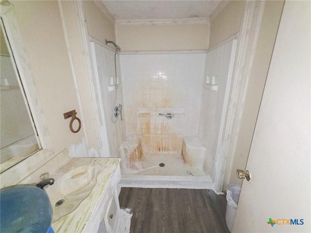403 Schell Rd, Victoria, TX 77904 - bathroom with ornamental molding, a walk in shower, wood finished floors, and vanity