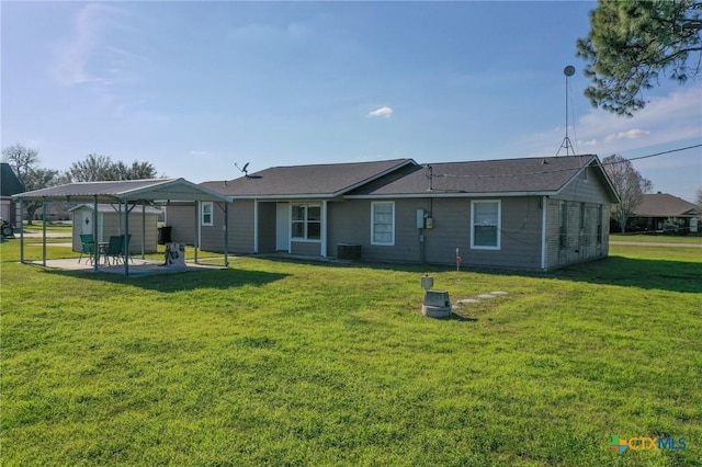 back of property with a patio, a lawn, and cooling unit