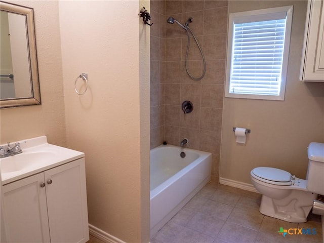 full bathroom featuring shower / bathtub combination, toilet, vanity, baseboards, and tile patterned floors