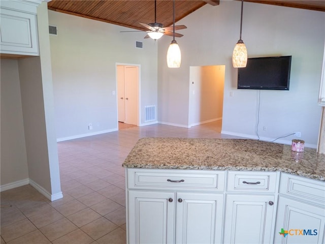 kitchen with open floor plan, high vaulted ceiling, and visible vents