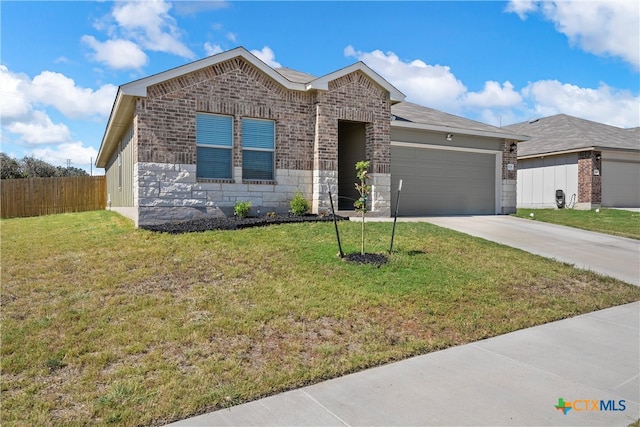 view of front facade featuring a front lawn and a garage