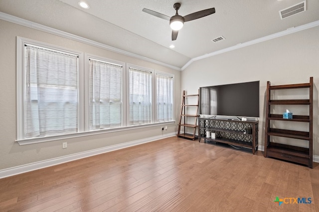 1169 Creek Cyn, New Braunfels, TX 78132 - living room with a ceiling fan, crown molding, wood finished floors, and baseboards