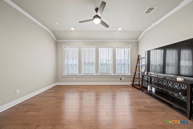 1169 Creek Cyn, New Braunfels, TX 78132 - living room featuring ceiling fan, crown molding, wood finished floors, baseboards, and a textured ceiling