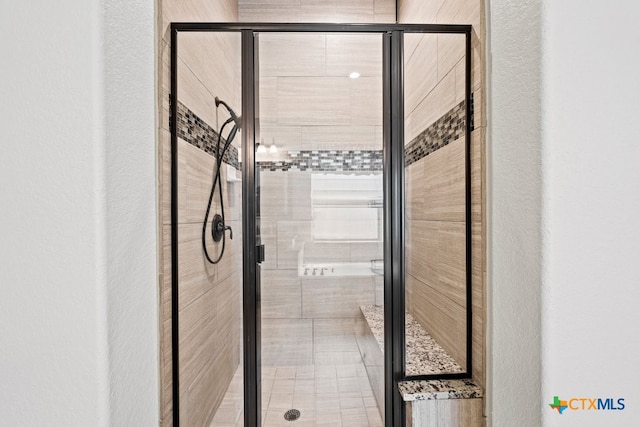 1169 Creek Cyn, New Braunfels, TX 78132 - full bathroom with a shower stall and a textured wall