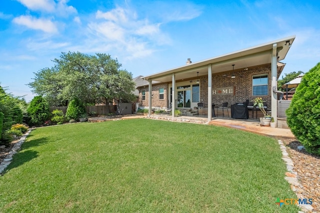 1169 Creek Cyn, New Braunfels, TX 78132 - rear view of house with brick siding and a patio area