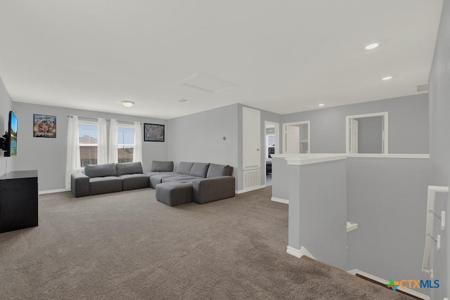 carpeted living room featuring recessed lighting, visible vents, and baseboards