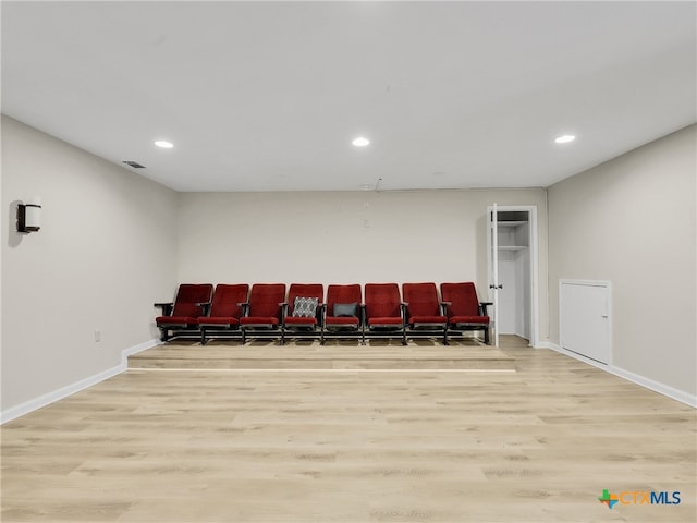 home theater featuring light wood-type flooring