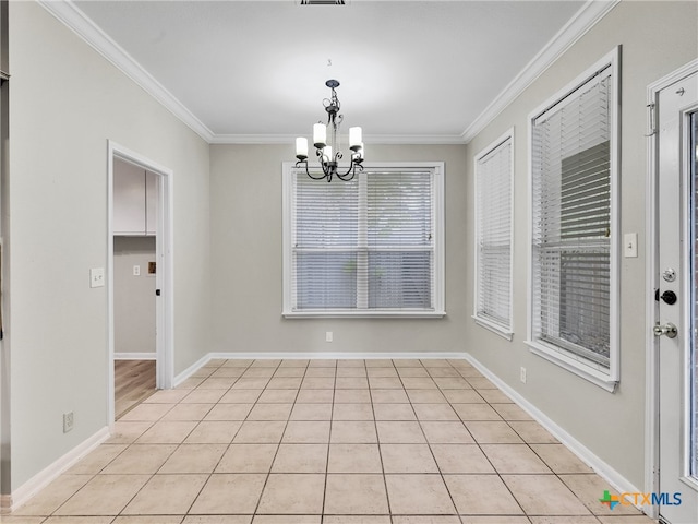 unfurnished dining area featuring crown molding, a notable chandelier, and light tile patterned flooring