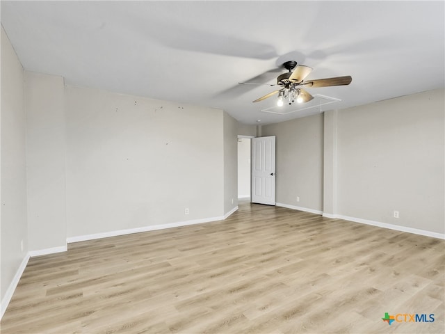 unfurnished room featuring ceiling fan and light hardwood / wood-style floors