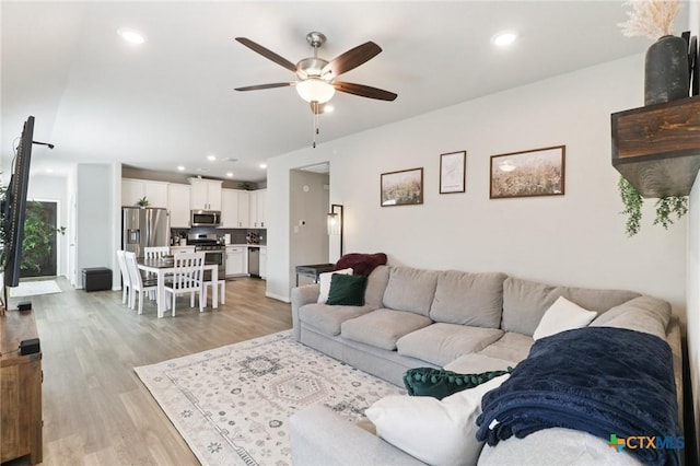 2024 Cowan Dr, New Braunfels, TX 78132 - living area with a ceiling fan, light wood-style flooring, and recessed lighting