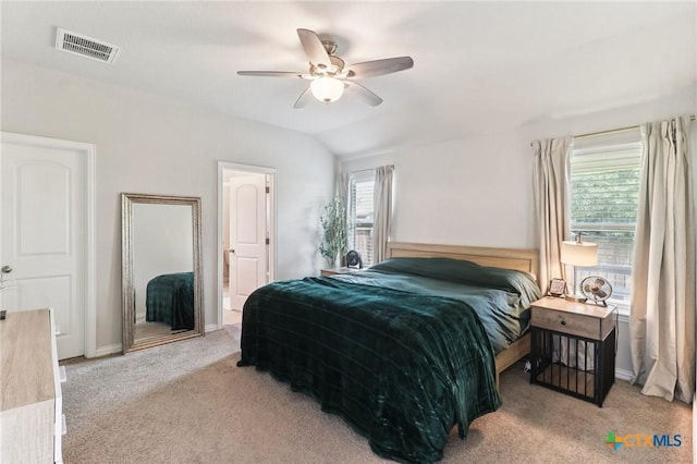 2024 Cowan Dr, New Braunfels, TX 78132 - bedroom featuring carpet floors, vaulted ceiling, and a ceiling fan