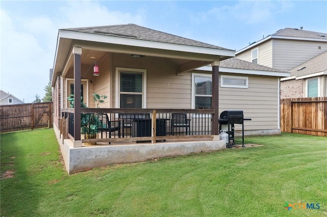 2024 Cowan Dr, New Braunfels, TX 78132 - rear view of house with roof with shingles and a fenced backyard