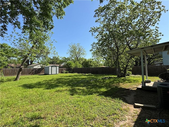 1308 E Park Ave, Victoria, TX 77901 - view of yard with a storage unit and an outbuilding
