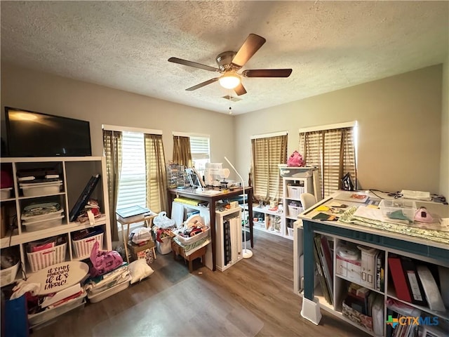 1308 E Park Ave, Victoria, TX 77901 - office area with ceiling fan, a textured ceiling, and wood finished floors
