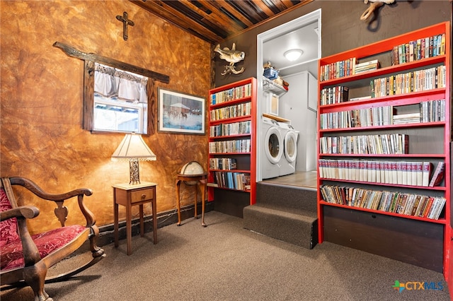 sitting room with independent washer and dryer, wooden ceiling, and carpet floors