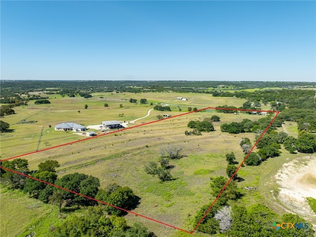 birds eye view of property featuring a rural view