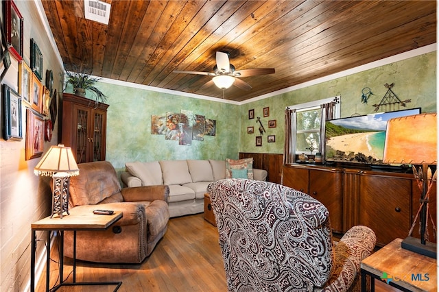 living room with wooden ceiling, wood-type flooring, wooden walls, and ceiling fan