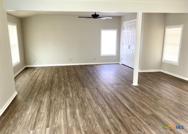 spare room featuring dark hardwood / wood-style flooring and ceiling fan