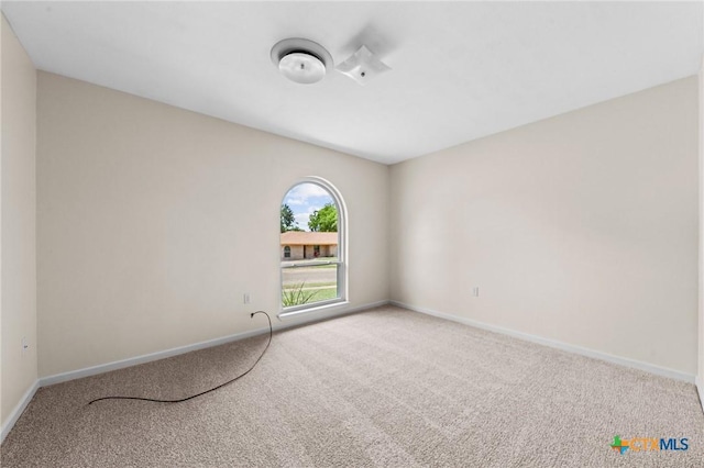 707 Dianne Dr, Copperas Cove, TX 76522 - carpeted empty room featuring baseboards