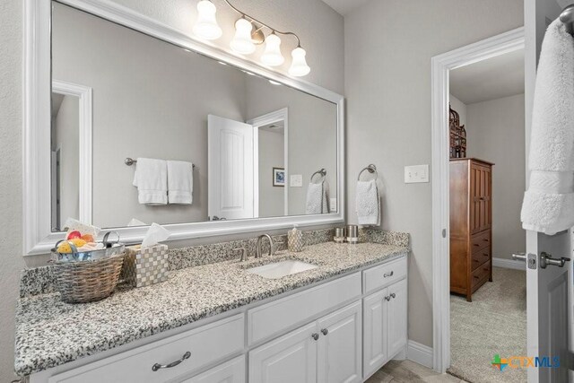 488 Creekside Dr, Belton, TX 76513 - bathroom with vanity and baseboards