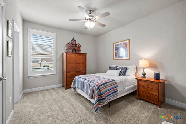 488 Creekside Dr, Belton, TX 76513 - carpeted bedroom featuring baseboards and a ceiling fan