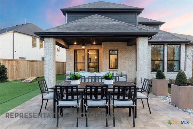 view of patio / terrace featuring a ceiling fan and outdoor dining area