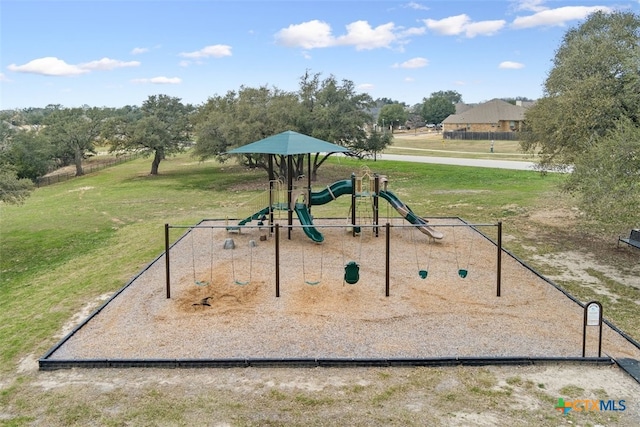 view of jungle gym with a yard