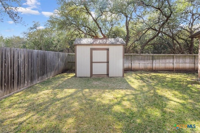 view of outdoor structure featuring a yard