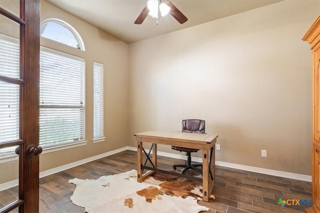 office area with ceiling fan and dark hardwood / wood-style flooring