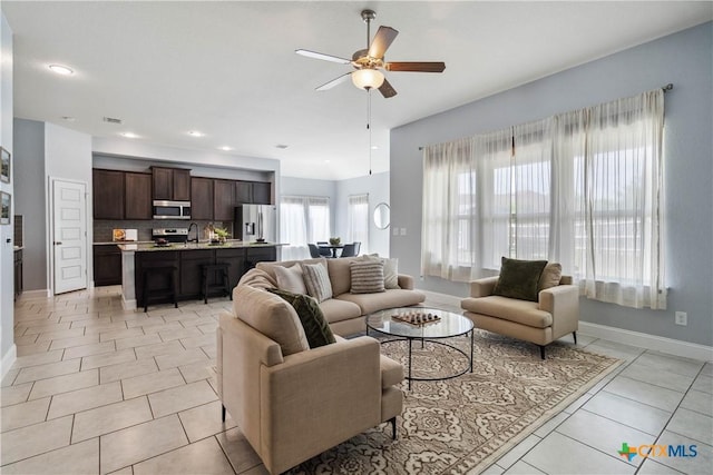 1433 Kamryn Way, New Braunfels, TX 78130 - living room with ceiling fan, baseboards, light tile patterned floors, and recessed lighting
