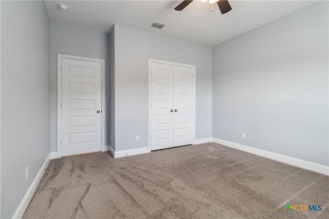 1433 Kamryn Way, New Braunfels, TX 78130 - unfurnished bedroom featuring carpet flooring, a closet, baseboards, and ceiling fan