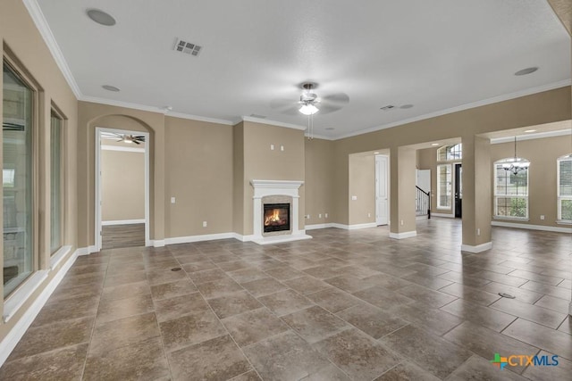 2194 Ranch Loop Dr, New Braunfels, TX 78132 - unfurnished living room with ceiling fan, a glass covered fireplace, and ornamental molding
