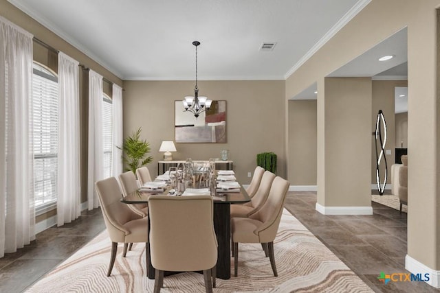2194 Ranch Loop Dr, New Braunfels, TX 78132 - dining room featuring a chandelier and crown molding