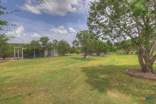 2194 Ranch Loop Dr, New Braunfels, TX 78132 - view of green lawn with an outbuilding