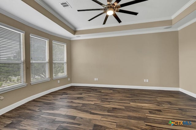 2194 Ranch Loop Dr, New Braunfels, TX 78132 - empty room featuring healthy amount of natural light, a ceiling fan, a raised ceiling, dark wood-type flooring, and crown molding