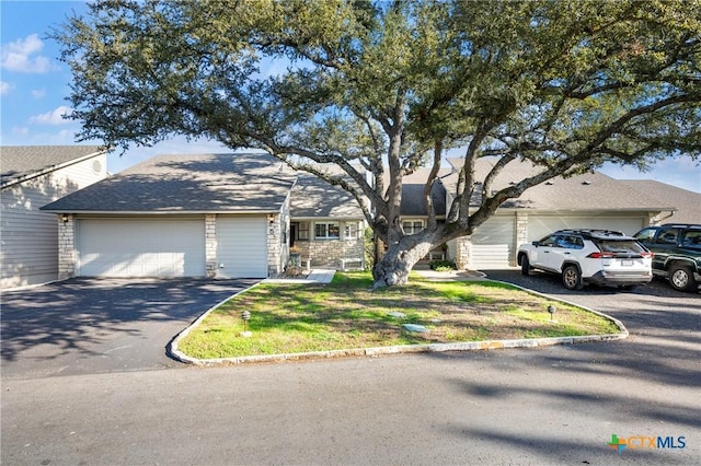 ranch-style home with a garage