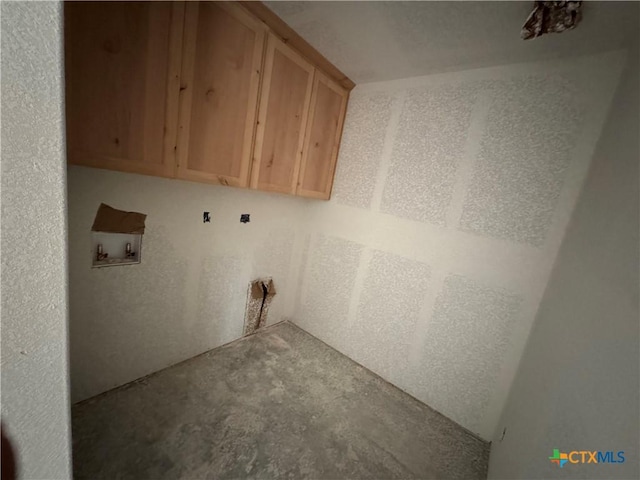 6001 Aquilla Dr, Killeen, TX 76542 - washroom with cabinet space and hookup for a washing machine