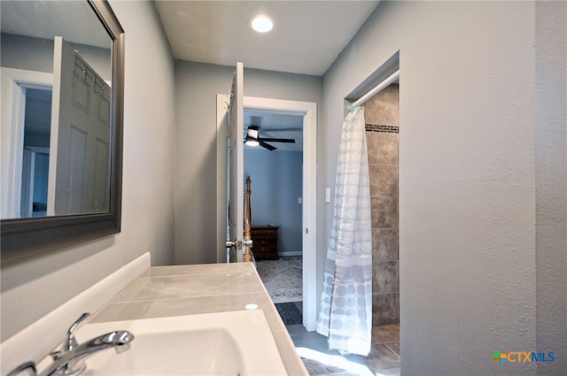 bathroom featuring vanity, a shower with curtain, and ceiling fan