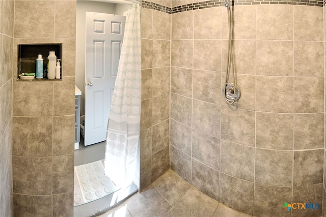 bathroom with a shower with curtain