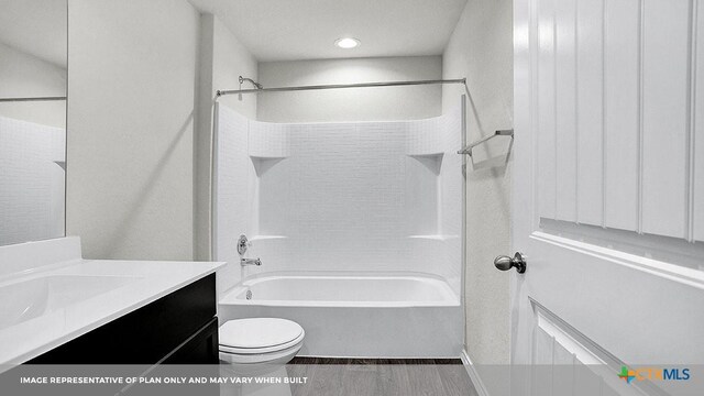 full bathroom with vanity, hardwood / wood-style floors, shower / bathtub combination, and toilet