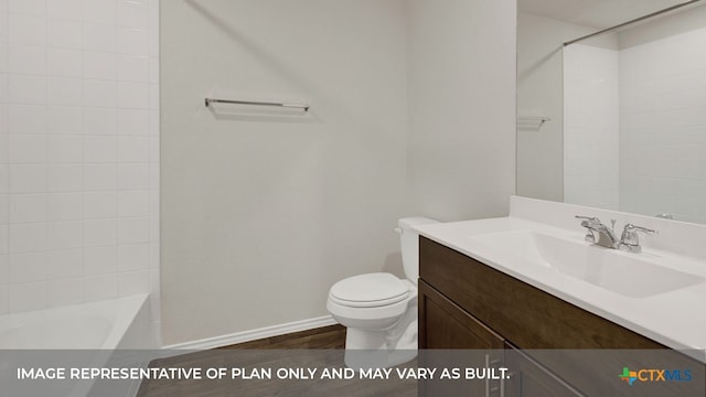 full bathroom featuring tiled shower / bath combo, vanity, hardwood / wood-style flooring, and toilet