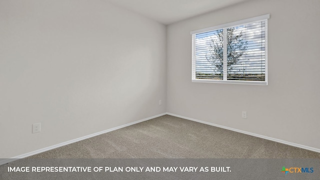 unfurnished room with carpet flooring