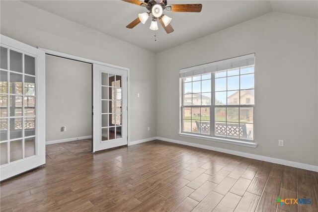 6203 Morganite Dr, Killeen, TX 76542 - spare room featuring wood finished floors, a ceiling fan, baseboards, and lofted ceiling