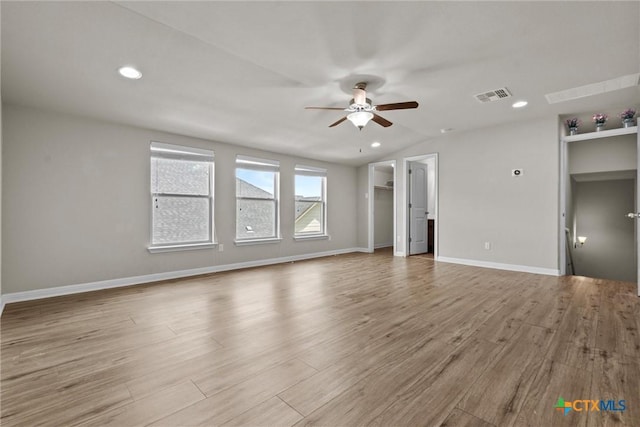 6203 Morganite Dr, Killeen, TX 76542 - unfurnished living room with ceiling fan, wood finished floors, vaulted ceiling, recessed lighting, and baseboards
