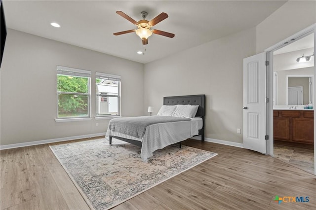 6203 Morganite Dr, Killeen, TX 76542 - bedroom with baseboards, light wood-style floors, a sink, ceiling fan, and recessed lighting