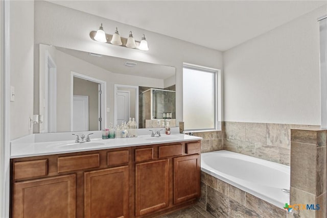 6203 Morganite Dr, Killeen, TX 76542 - bathroom with a shower stall, a garden tub, and double vanity