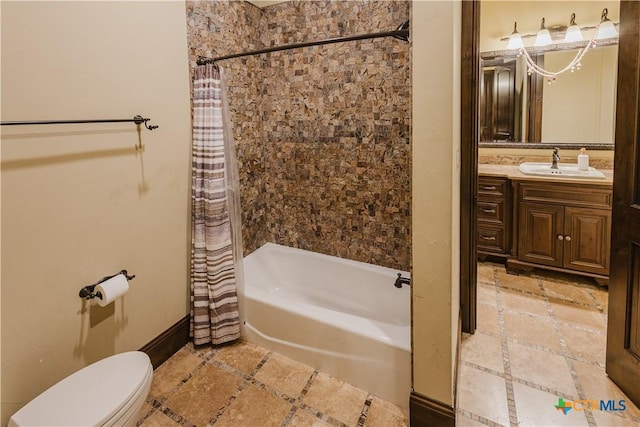 full bathroom featuring vanity, shower / bath combination with curtain, and toilet