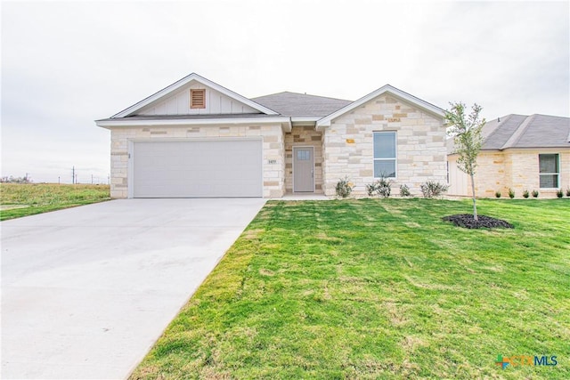 single story home with a front lawn and a garage