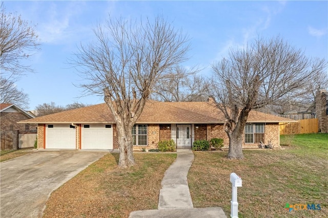 single story home with a front yard and a garage