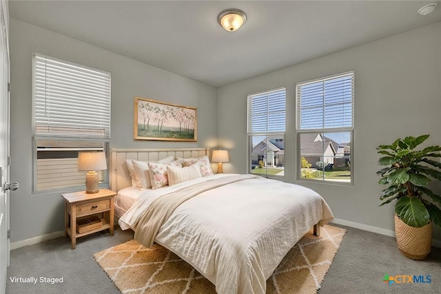 bedroom with light carpet